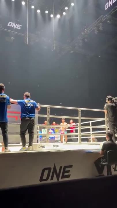 A Muay Thai bout seen from the seats at a ONE Championship event