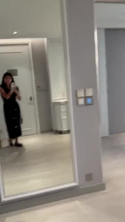 The hotel suite, filmed from the doorway